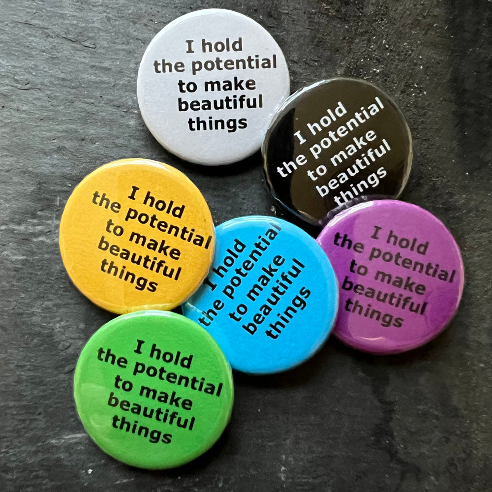 Six I hold the potential to make beautiful things in black, blue, pink, green, yellow, and white.