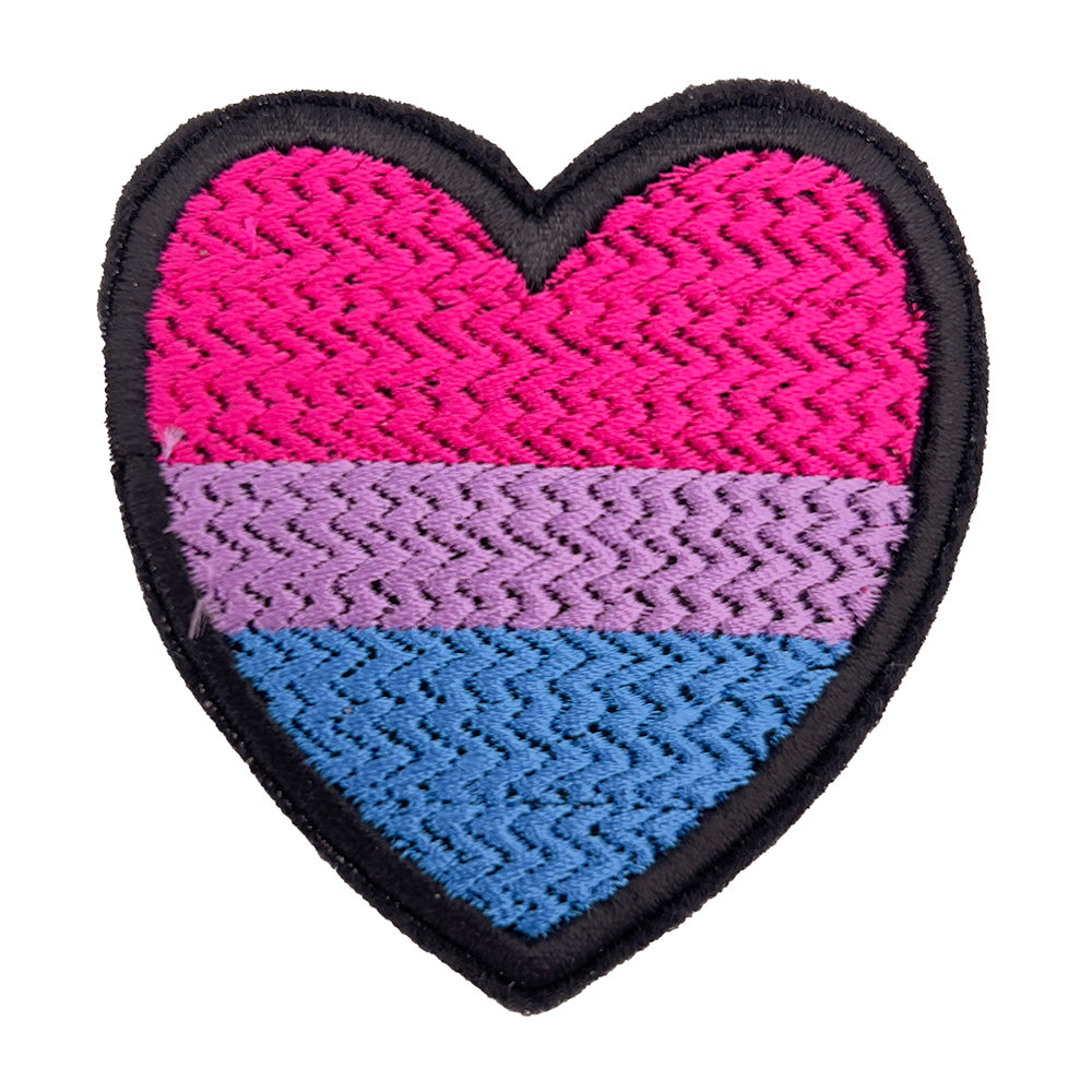 Close-up image of a bisexual pride flag heart-shaped embroidered felt patch. The patch has horizontal stripes in pink, purple, and blue.