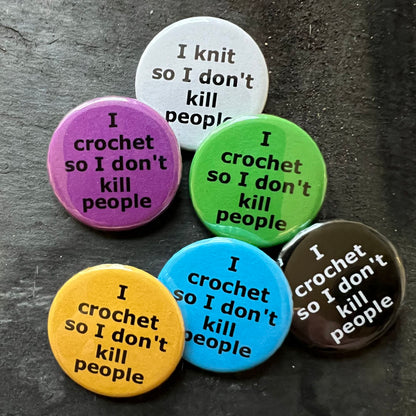 Six I crochet so I don't kill people pin badges in black, blue, pink, green, yellow, and white.