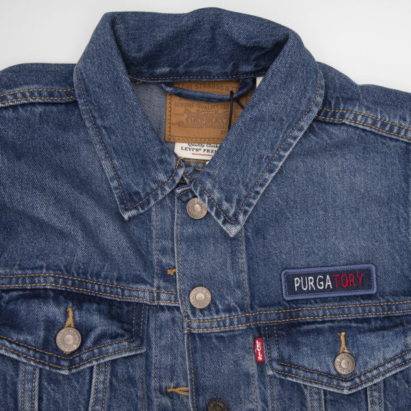 denim jacket and blue denim patch embroidered with the word PURGATORY