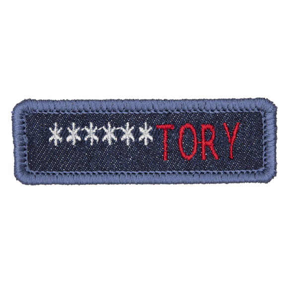 blue denim patch embroidered with the word ******TORY