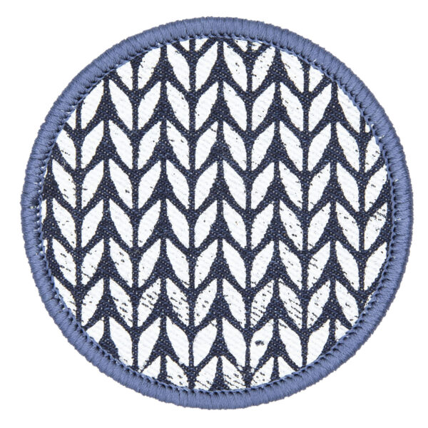 patch made from blue denim screen printed with a garter stitch print and finished with an embroidered border
