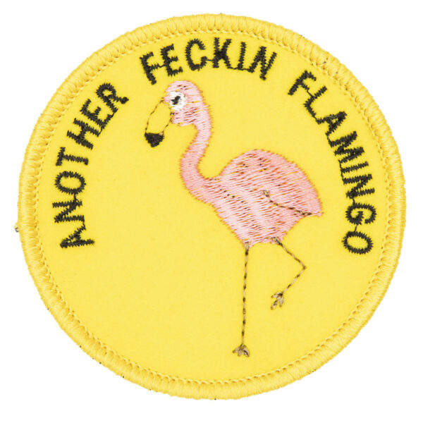 round embroidered patch picture of pink flamingo and text another feckin flamingo on yellow