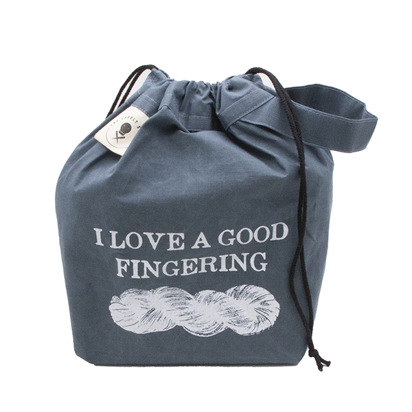bag with drawstrings clodes. small slate blue drawstring project bag. The bag is printed with text "I LOVE A GOOD FINFERING" and a skein of yarn in white ink. The bag has a handle, a drawstring and a cream label with The Unruly Stitch logo