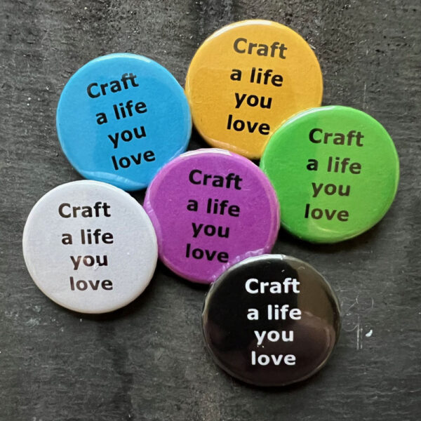 Six badges with the words Craft a life you love. Black text on blue, yellow, green, pink and white, white text on black background.