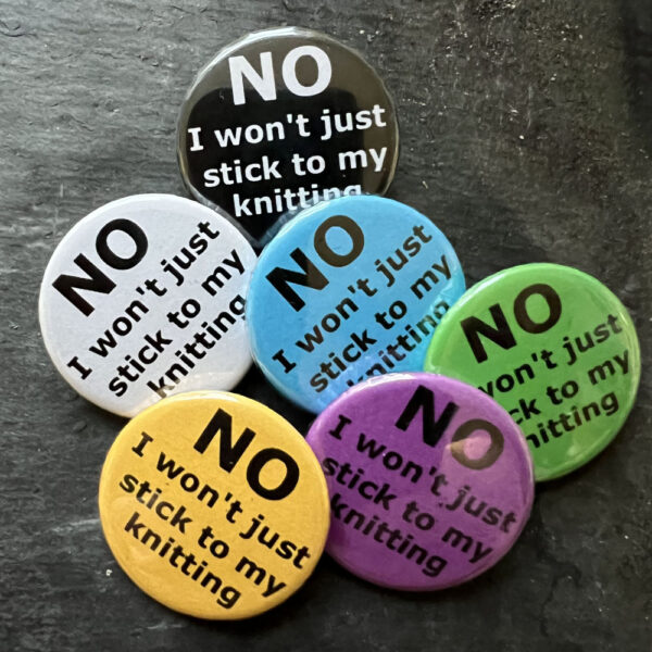 Six badges with the words NO I won't just stick to my knitting. Black text on blue, yellow, green, pink and white, white text on black background.
